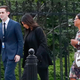 Kim Kardashian West (center) arrives at the security entrance of the White House in Washington, D.C., on May 30, 2018.